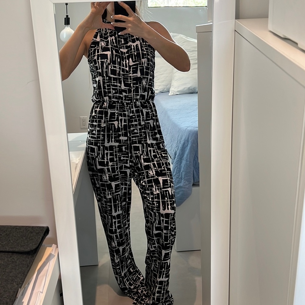 Women One size fits all black and ivory jumpsuit with elastic on waist halter
